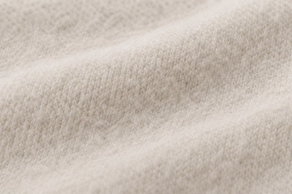 ภาพประกอบผ้า Extra Soft Plus (ผ้าคอตตอน 100%) ซูมใกล้ให้เห็นลายถักของผ้ายืด