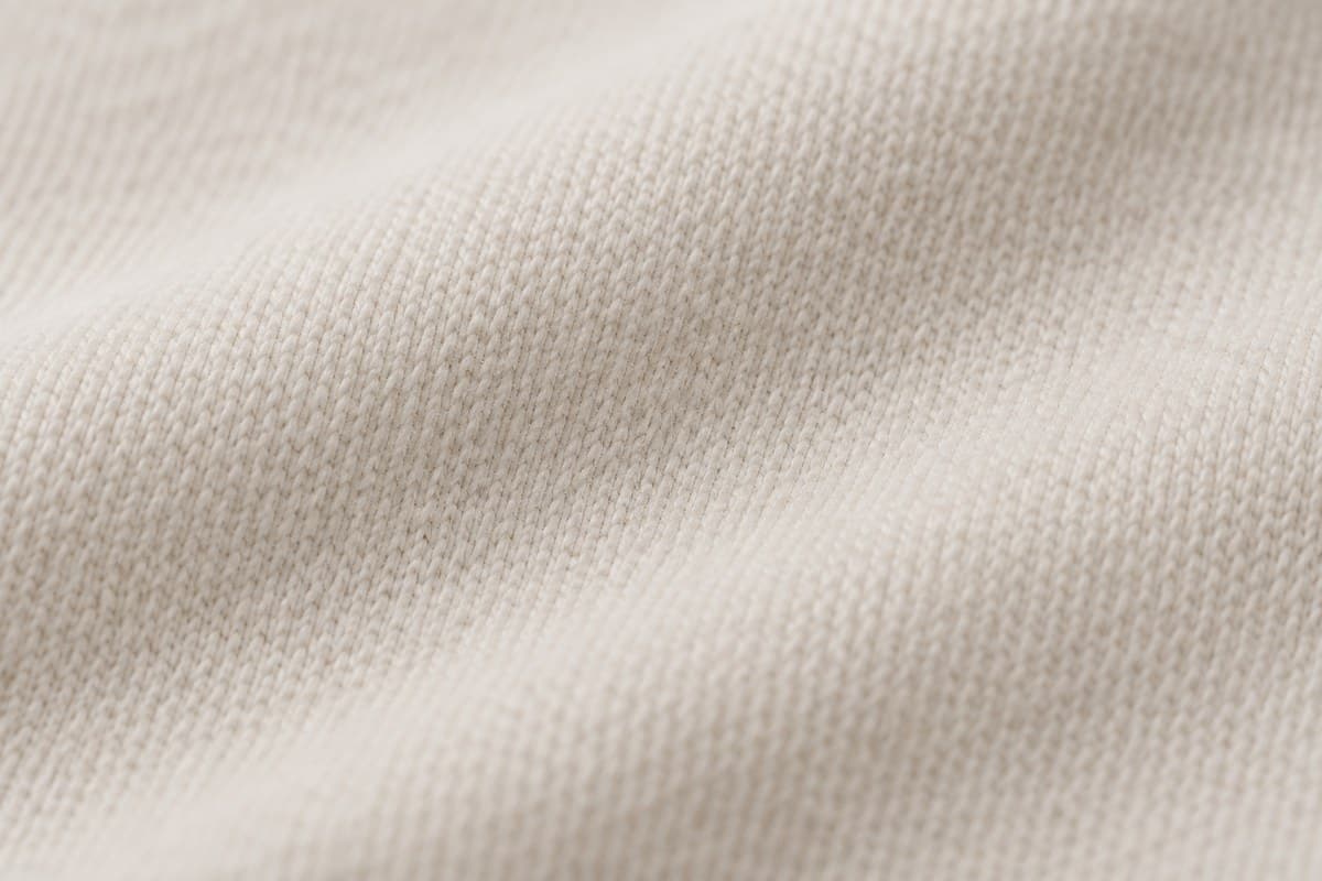 ภาพประกอบผ้า Extra Soft (ผ้าคอตตอน 100%) ซูมใกล้ให้เห็นลายถักของผ้ายืด