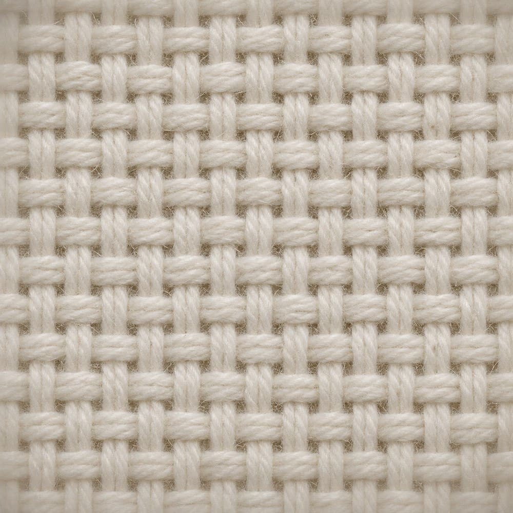 ภาพประกอบเนื้อผ้า Cotton Spundex (ผ้าไมโคร) ที่ใช้ผลิตเสื้อเชิ้ต ขยายให้เห็นโครงสร้างการทอ